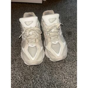 New balance white 9060 in gray shape. Size 5 kids but I am a size 6.5 and fit